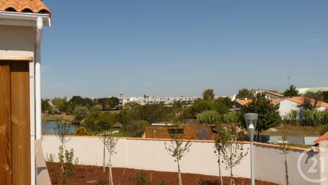 Appartement F3 à louer - 3 pièces - 59.0 m2 - AYTRE - 17 - POITOU-CHARENTES - Century 21 Agence Du Centre Ville