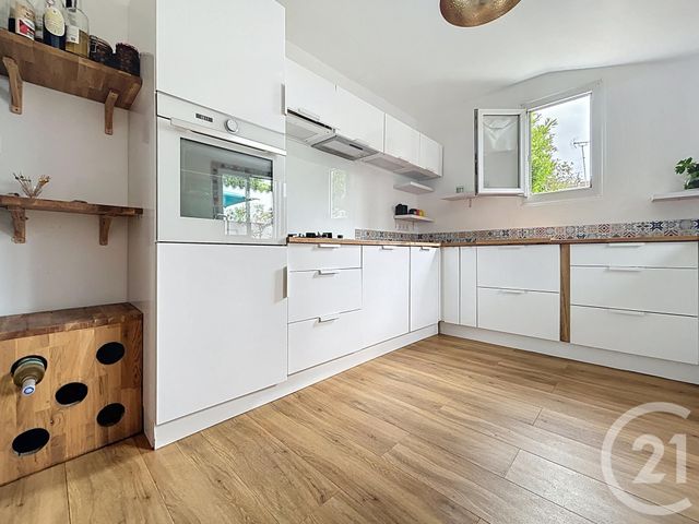 maison à louer - 4 pièces - 102.4 m2 - ROCHEFORT - 17 - POITOU-CHARENTES - Century 21 Agence Du Centre Ville